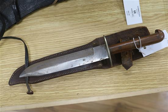 A Kukri with accessories to scabbard and a Burmese dagger